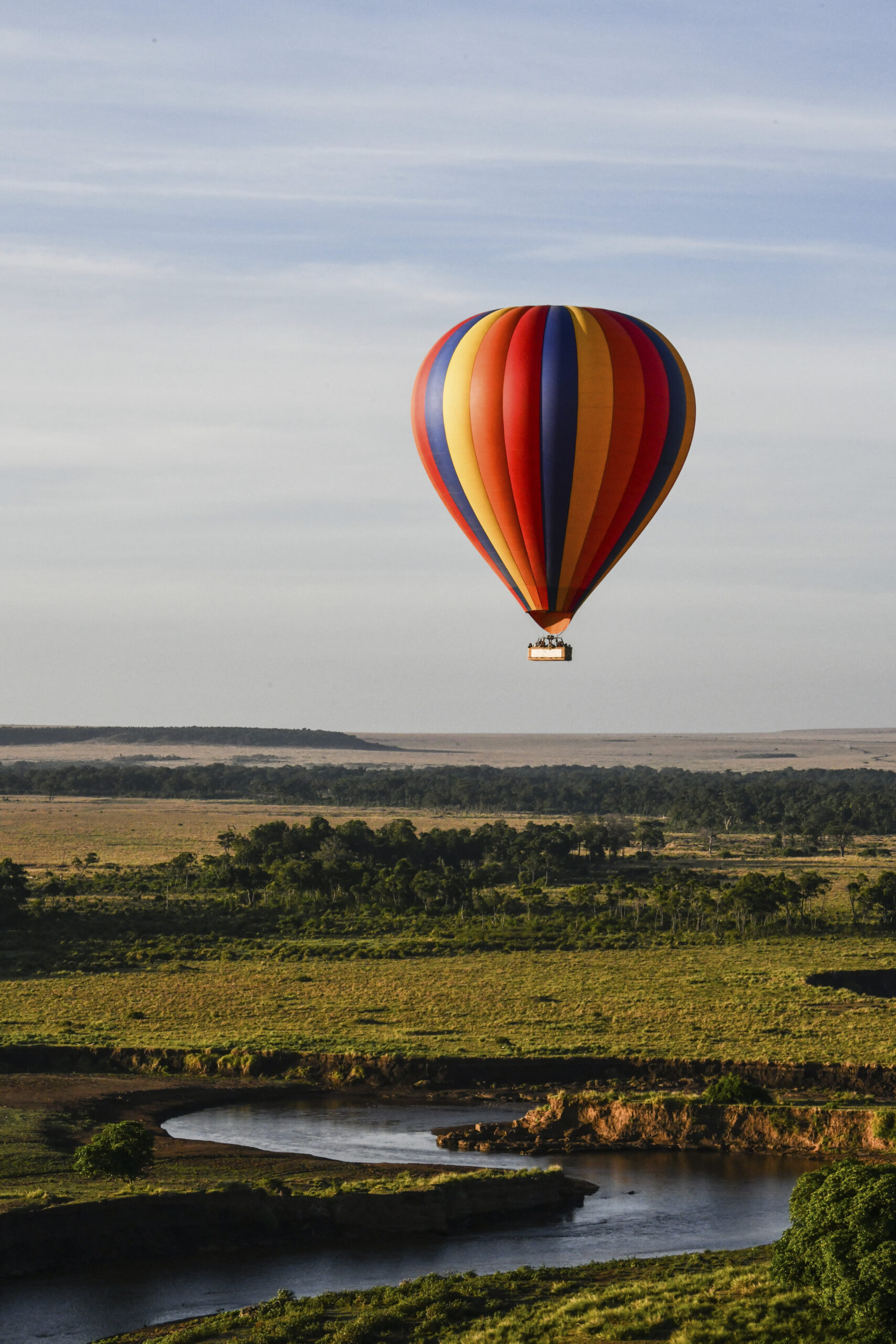 Air balloon floating over Mara River, Kenya